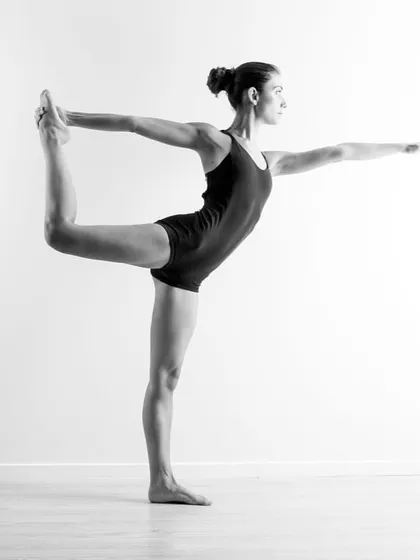 Trust the flow, trust your body. This image embodies the balance and control that is at the heart of the Pilates practice.