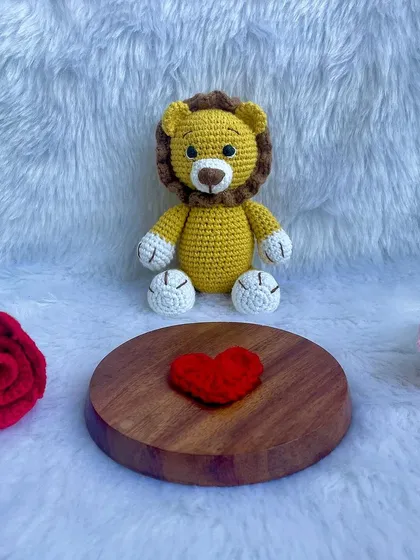 A classic yellow lion, perfect for cuddling. This design is one of my bestsellers and can be personalized with initials upon request.