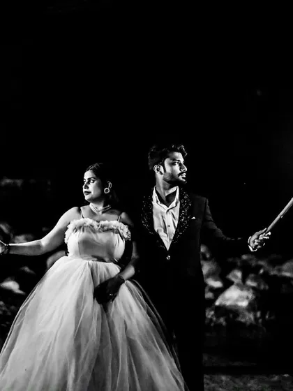 For couples looking for something dramatic, we incorporate creative elements like fire torches. This black and white pre-wedding photo creates a powerful, edgy, and unforgettable image.