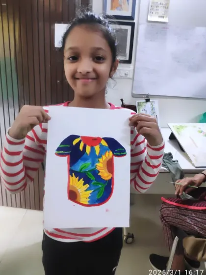 Designing for fun! Myra from our PP2 batch created this imaginative T-shirt design featuring sunflowers, using bold colors and patterns.