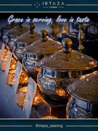 Our collection of intricately designed serving bowls, lined up and illuminated by candlelight, adds a touch of grace and sophistication to the buffet line.