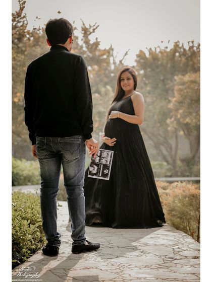 A creative reveal shot where the mom-to-be holds the sonogram pictures. It’s a beautiful way to announce the upcoming arrival and include the baby in the photos.
