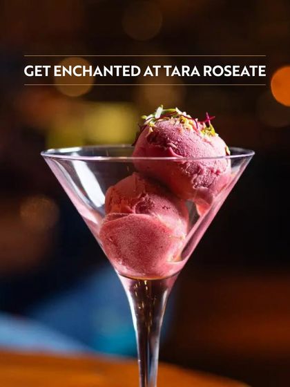 Get enchanted at Tara Roseate with this beautiful glass of sorbet. The soft, ambient lighting and artistic presentation make it an ideal spot for a sweet ending to a romantic meal.