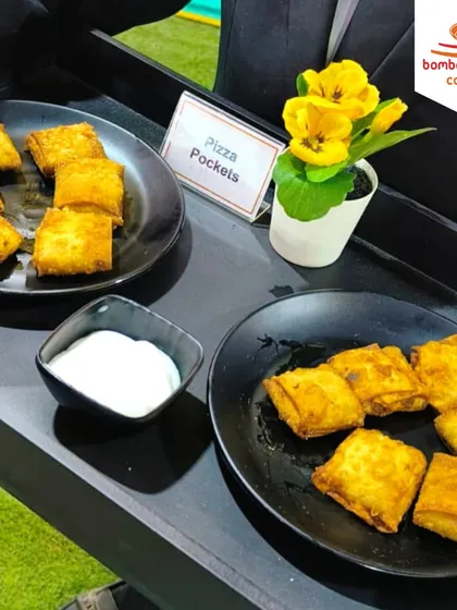 A fusion favorite, our Pizza Pockets are crispy parcels filled with cheese, vegetables, and pizza sauce. They are served with a creamy dip and are perfect for parties.