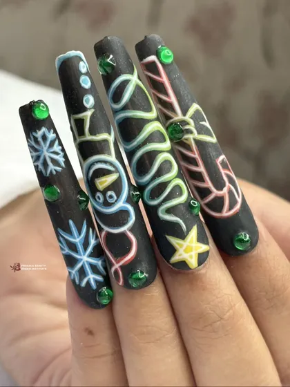 A different take on holiday nails, this set features neon-style Christmas drawings on a matte black base, including a snowman, candy cane, and tree.