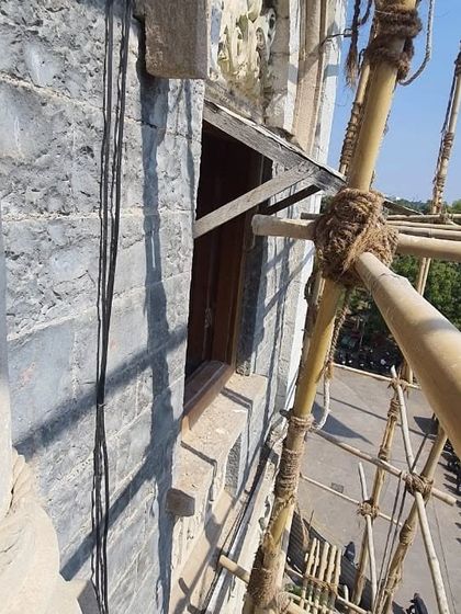 Our team carefully ran wiring along the structure, ensuring it was hidden from view to not disrupt the building's historical aesthetic. Every detail of the installation was planned to be as non-invasive as possible.