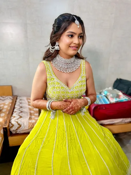 Glammed up in lime green and glowing like a dream. This fresh and vibrant look is perfect for a Mehendi or engagement party.
