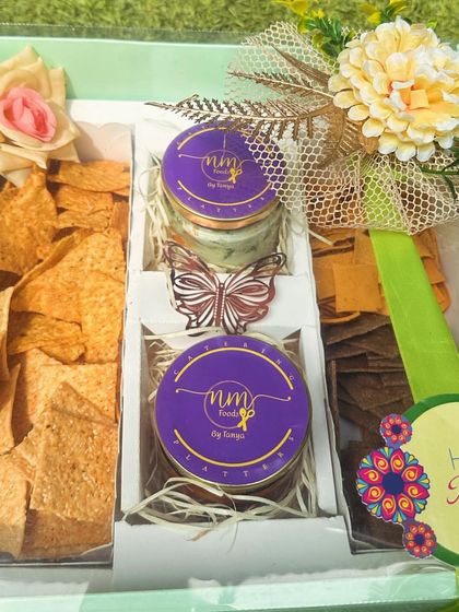 My Cracker Box, beautifully packaged for Rakhi gifting. It's a thoughtful and delicious present for any festive occasion.