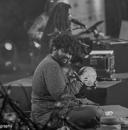 A candid shot of our percussionist, Vivek Santhosh, during the Bengaluru Ganesh Utsava performance.