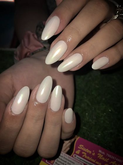 A still image of the pearly white chrome nails, perfect for a clean and sophisticated look.