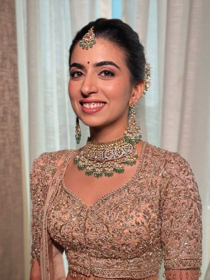 Another shot of this glowing bride. Her makeup is fresh and light, perfect for a day wedding.