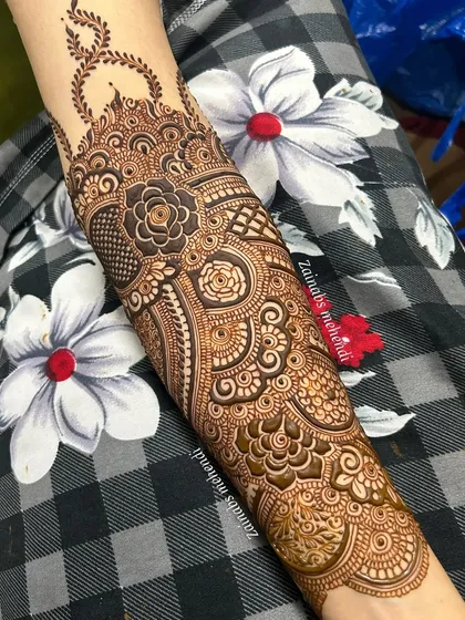The full forearm design for Leena, showing the beautiful flow of the patterns.