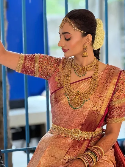 A candid shot of the bride, showing how the makeup looks beautiful and natural in a relaxed setting.