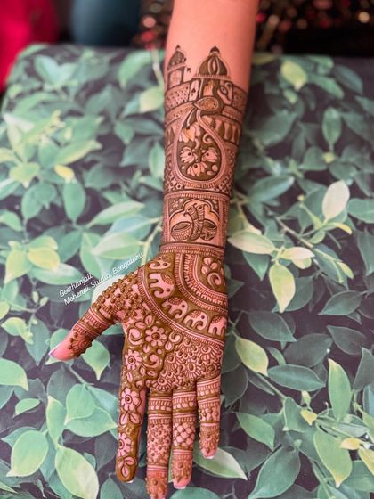 The final result of the design seen in progress in image 76, a beautiful full arm piece.