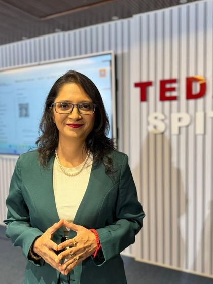 A photo of me at a TEDx SPIT event. I've learned that the moment you stop doubting and start believing you can fly, everything changes. The pen is your wing.