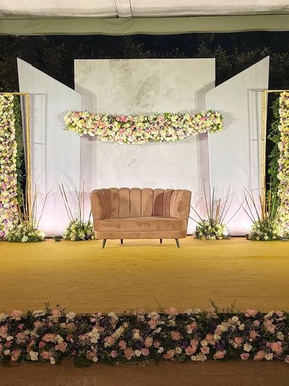 The same modern pastel stage, with a soft floral border added along the front, enhancing the serene and tranquil aesthetic.