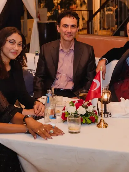 A table of happy guests enjoying their evening. Our goal is to create a welcoming environment for everyone.