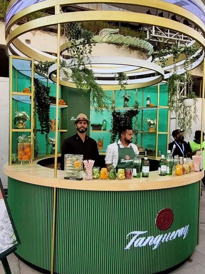 Our team working at a branded pop-up bar for a Gin Fest. We are experienced in collaborating with brands for corporate events, festivals, and promotions, providing professional staff and a high-quality setup.