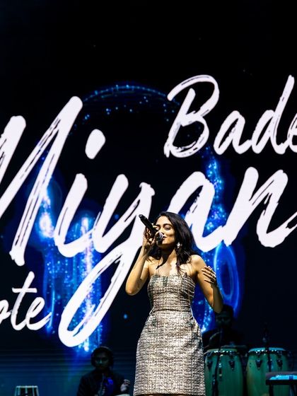 Performing in front of the tour branding. I have experience working on professionally managed, large-scale music tours.