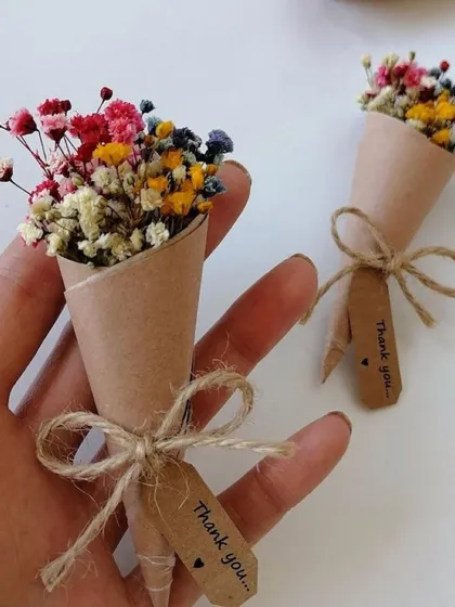 It's the little things that show you care. I love providing these tiny, handcrafted bouquets of dried flowers as 'Thank You' favors for guests.