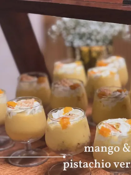 A different angle of the Mango & Pistachio Verrine, showing the beautiful layers and generous toppings. The presentation in stemmed glasses adds a touch of elegance.