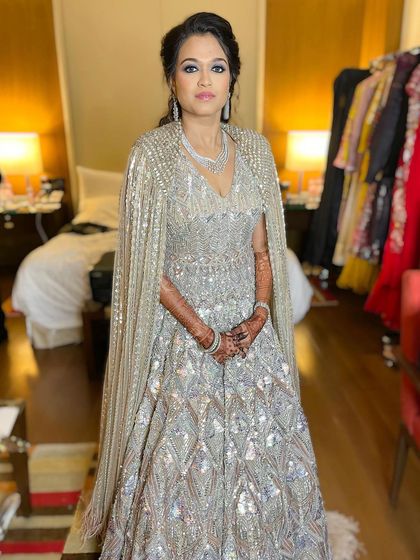 The full look is pure glamour, perfect for a wedding reception or a high-end cocktail party.