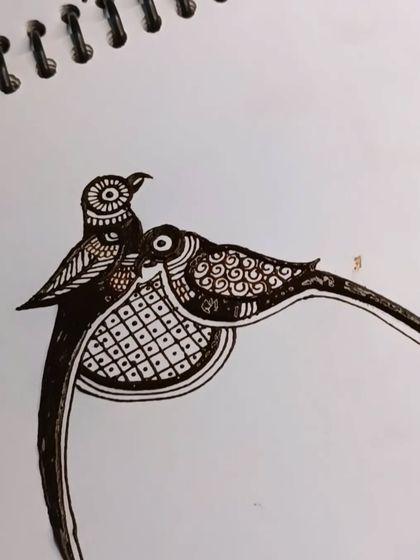 Adding fillers like checks and spirals to the parrot design. This step adds depth and completes the motif.