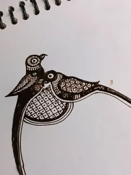 A practice sketch of two lovebirds, a common motif in bridal mehndi symbolizing partnership and love.