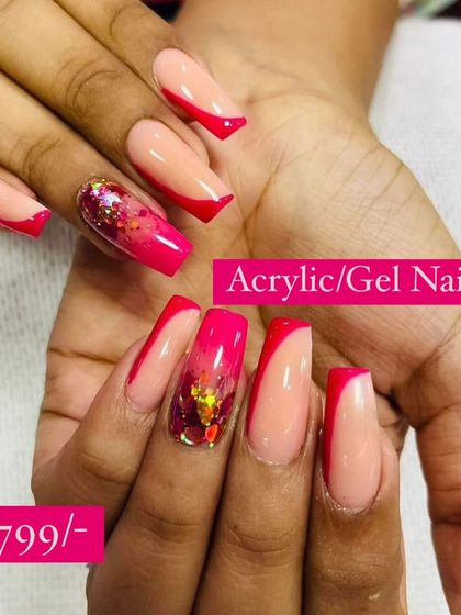 A stylish and modern acrylic set with red accents and glitter, available as part of a special offer.