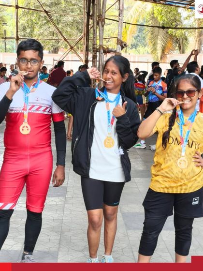 Our gold medal-winning roller skaters from the Endurance Kalyan Dombivli District Roller Skating Championships proudly bite their medals in celebration.