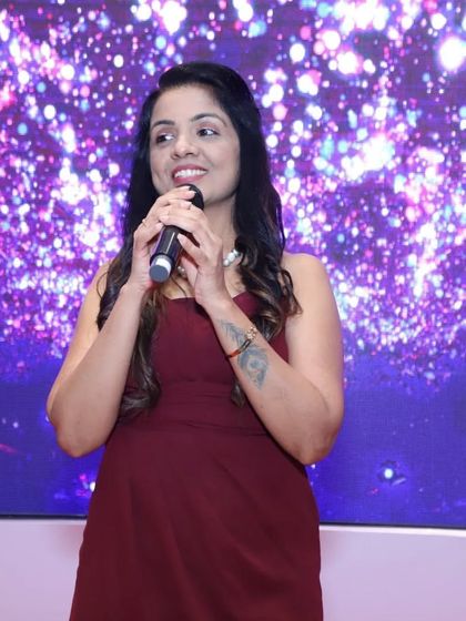 A smile and a microphone are my tools to create a welcoming atmosphere. Here at the Honor Mobile launch, I focused on making the tech-focused content accessible and exciting for everyone present.