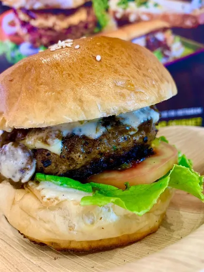 This is my caramelised oyster mushroom burger, a favourite even among meat lovers. The patty is spiced with a desi mix of coriander and jeera for that deep, umami flavour that makes it a truly satisfying gourmet burger experience.