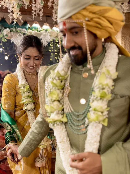 A sweet moment of the couple walking together.