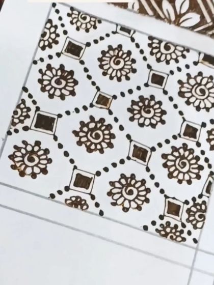 This simple but effective grid pattern uses small spiral flowers and dots. It's a great filler for beginners to master.
