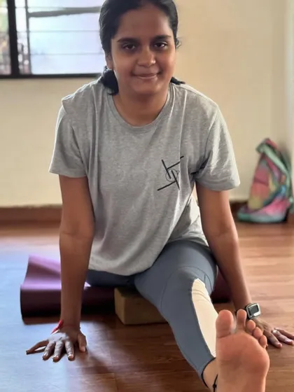 Our teacher training student, Prerana, working on her front splits. Her dedication over 6 months shows how our training programs develop both personal practice and teaching skills.