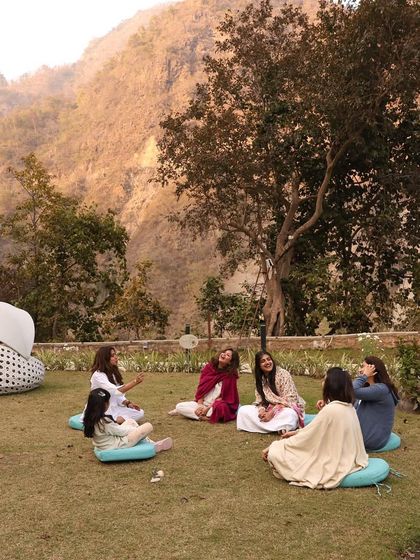 Another view of our women's circle, sharing and connecting in the peaceful garden. The youngest member of our group brought so much light and wisdom to our circle.