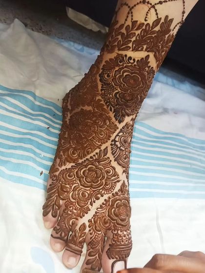 The rich, dark stain of a completed foot design. This shows the beautiful color that develops from my 100% organic henna paste.