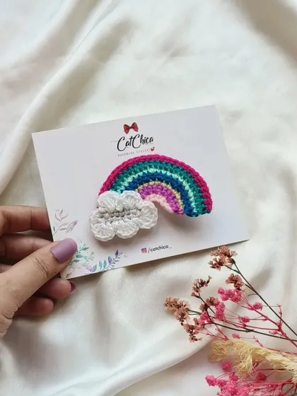 Our crochet rainbow with a cloud, a symbol of hope and happiness that I love to create.