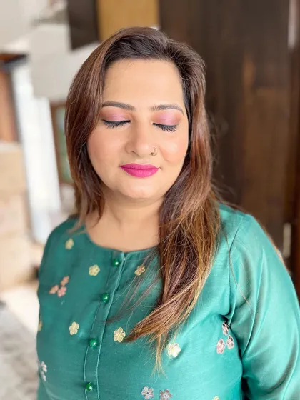 The 'after' shot. I created a flawless base that covers any texture or unevenness, paired with a soft pink eye makeup look.