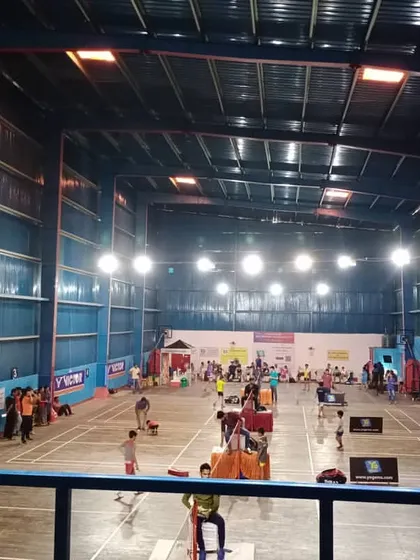 This is the energy you can expect at my Indirapuram center. This high-angle view shows multiple badminton matches in full swing during a championship, with ample space for players, officials, and spectators. My arena is designed to handle the excitement of a large-scale tournament.
