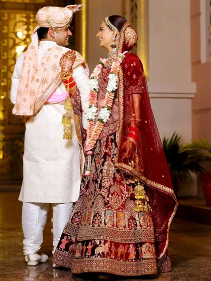 A candid moment of love and laughter right after the main ceremony. These are the real, unposed memories that make your wedding album special.