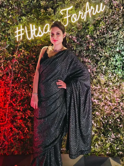 Setting a chic and glamorous tone for a cocktail night. I believe the host's attire is key to complementing the event's vibe, and for this evening, a sparkling saree was the perfect fit.
