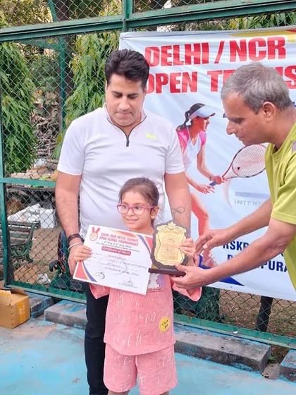 Another one of our young girls receiving her award. It is great to see so many of our female players excelling in tournaments.