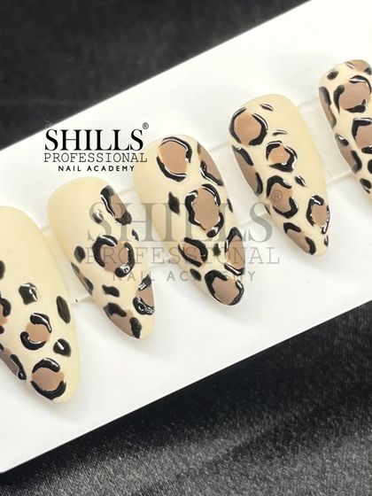 A classic and perfectly executed leopard print design, hand-painted for a timelessly fierce look.