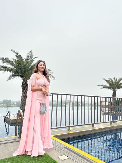 A lovely pink outfit for a morning event in Agra. The cape added a touch of elegance to this simple and chic co-ord set.