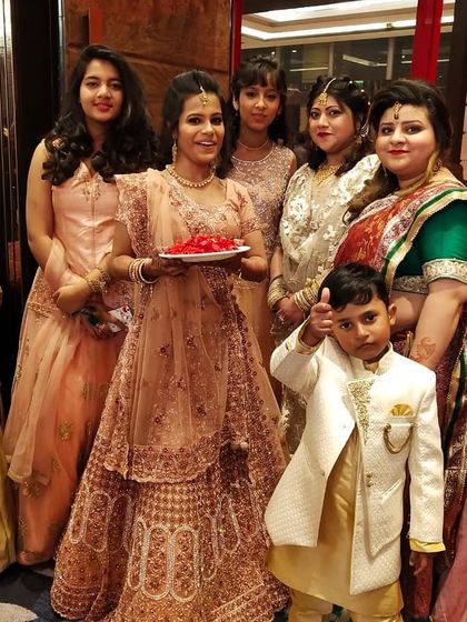 I love seeing the whole family ready and happy together. This photo captures the bride with her family and friends, for whom I had the pleasure of providing makeup services for the wedding day.