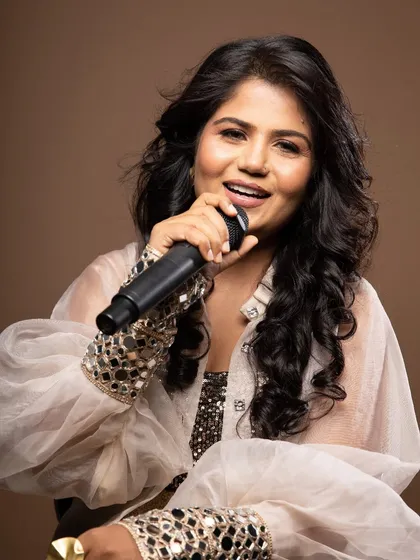 Beyond bridal, I specialize in makeup for photoshoots and performers. Here, I created a polished, camera-ready look for a singer, ensuring her makeup was flawless under professional studio lighting.