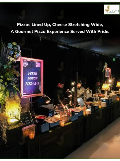 Our interactive 'Fresh Dough Pizza Bar' is a crowd favorite, offering guests a live culinary show and delicious, custom-made pizzas in a stylish, rustic setup.