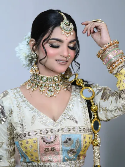 Another angle of this gorgeous look. The skin looks dewy and fresh, which is a trend many modern brides love.