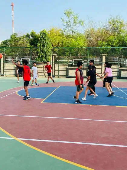A player takes a shot from the perimeter.